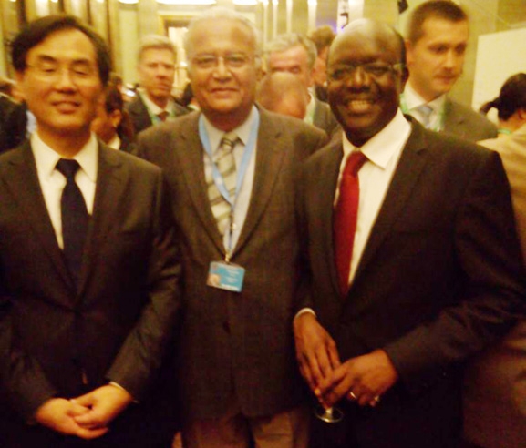 With James Zhan, Director, Investment & Enterprise Divison on his right and Mukhisa Kituyi, Secretary General, UNCTAD on his left after the grand opening of the World Investment Forum 2014 at United Nations Office at Geneva on September 24, 2014